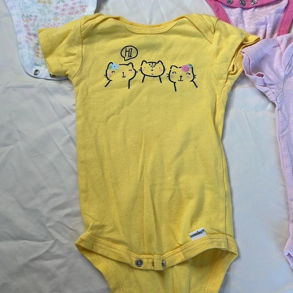 Onesie brand set of 7, size 6-9 month short sleeve bodysuits. GREAT CONDITION.